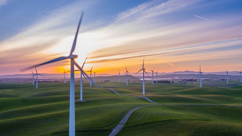 Wind turbines at sunset.